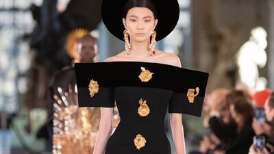 Schiaparelli's collection was graphically portrayed in black, white and gold. Photo: Schiaparelli