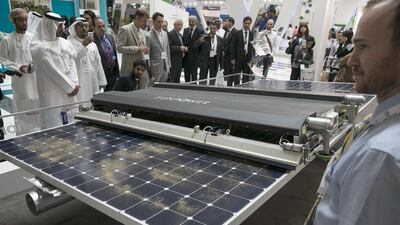 About 1,000 solar power jobs will be created in the UAE over the next two years. Above, a Sunpower robot. Silvia Razgova / The National