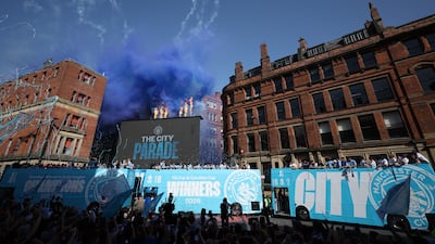 Players of Manchester City take part in an open-top bus parade in Manchester, Britain, 25 May 2026. Manchester City won the League Cup and FA Cup and Manchester City Women won the WSL in the 2025/2026 season. EPA / ADAM VAUGHAN