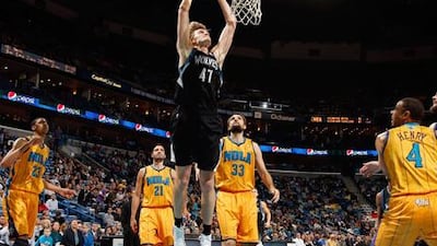 Minnesota's Andrei Kirilenko dunks the ball against New Orleans.