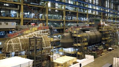 HMS Artful, the third of the seven Astute-class submarines to be built at Barrow, approaches completion at the BAE Systems' company’s Devonshire Dock Hall. Phil Noble / Reuters