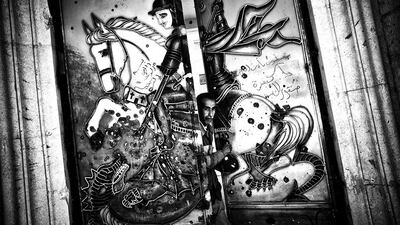 The bullet riddled door of the Mar Tuma (St. Thomas) church in Ras ai Ain. The church was damaged by Islamic insurgents when they took control of the town from Government forces.