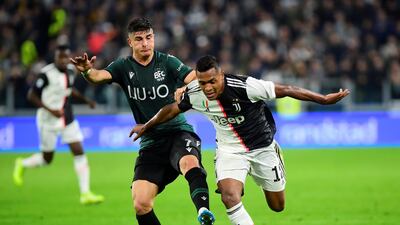 Soccer Football - Serie A - Juventus v Bologna - Allianz Stadium, Turin, Italy Juventus' Alex Sandro in action with Bologna's Riccardo Orsolini. REUTERS