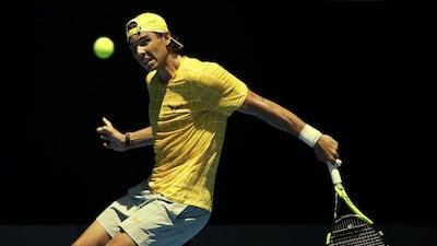Rafael Nadal hits a shot during a practice session at Melbourne Park on Saturday ahead of the Australian Open. Issei Kato / Reuters