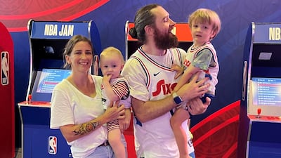 Christina Schweitzer and Rich Stead at the NBA District with their sons Shai, one, and Isaiah, three. Evelyn Lau / The National