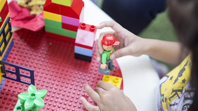 A girl plays at Dubai Parks and Resorts’ Legoland event, where they announced the launch of their annual passes. Reem Mohammed / The National