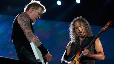 James Hetfield, lead vocalist, and Kirk Lee Hammett (R) of heavy metal band Metallica, perform at their World Magnetic tour concert in Abu Dhabi October 25, 2011. Reuters