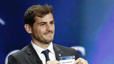Spain's Iker Casillas draws Real Madrid during the draw ceremony for the Uefa Champions League group stage at Grimaldi Forum in Monaco, August 28, 2014. SEBASTIEN NOGIER / EPA