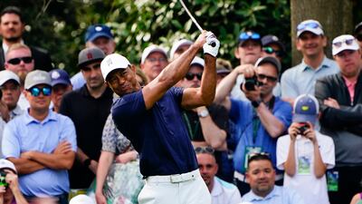 Tiger Woods tees off on the seventh hole during a practice round for The Masters. AP