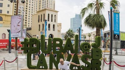 Surfing over a 3-D painted waterfall. Courtesy Dubai Media Office