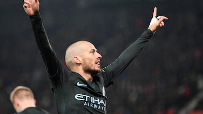 David Silva of Manchester City celebrates as he scores their second goal against Stoke City. Michael Regan/Getty