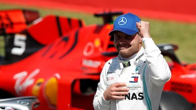 Valtteri Bottas celebrates after claiming pole for the Spanish Grand Prix. Reuters