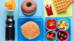 The emirate has prohibited parents and children from bringing sodas, pastries, fried food and other unhealthy items into schools. Getty