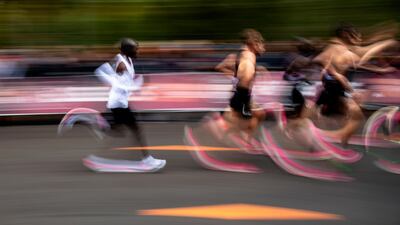 Eliud Kipchoge (L, in white), Kenyan marathon world record holder, in action next to his pacemakers during the INEOS 1:59 Challenge in Vienna, Austria. Kipchoge attempts to beat his own record becoming the first human to run a marathon in under two hours. EPA