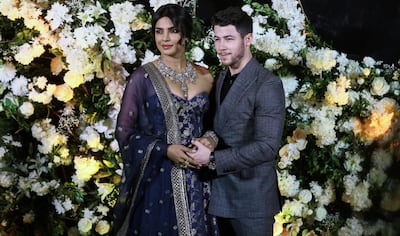 Priyanka Chopra pictured with husband Nick Jonas during their wedding reception in Mumbai, India, last month. EPA.