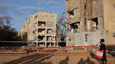 The site of an Iranian missile attack is sealed off in the southern Israeli city of Arad. EPA