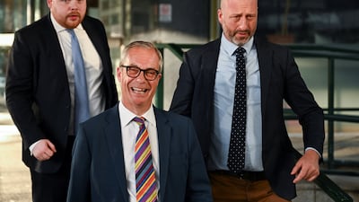 Reform UK leader Nigel Farage reacts as he leaves Millbank Tower following the results of the local elections, in London. Reuters