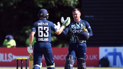 Cricket - Third One Day International - Netherlands v England - VRA Cricket Amsterdam, Amstelveen, Netherlands - June 22, 2022 England's Jason Roy and Jos Buttler celebrate at the end of the match REUTERS / Piroschka Van De Wouw