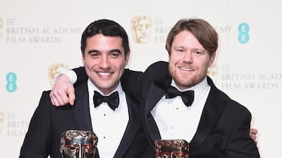 Naji Abu Nowar and Rupert Lloyd with their Baftas for ‘Theeb’. Ian Gavan / Getty Images
