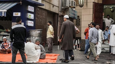 People waiting for iftar time in Naif. Photo Courtesy: Frying Pan Adventures