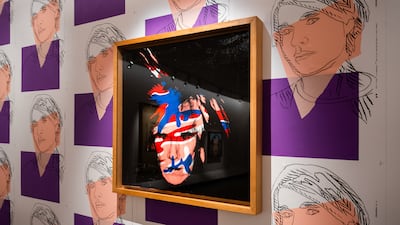 Among the most fascinating works being displayed at Maraya, in Saudi Arabia's AlUla, is a self-portrait of Andy Warhol placed over his signature wallpaper design. Photo: Arts AlUla / The Andy Warhol Foundation for the Visual Arts