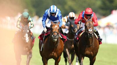 Paul Hanagan on Muthmir , centre, on his way to winning the Qatar King George Stakes at Glorious Goodwood. Matthew Childs / Reuters