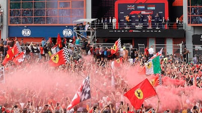 Ferrari fans celebrate Charles Leclerc's podium finish. Reuters