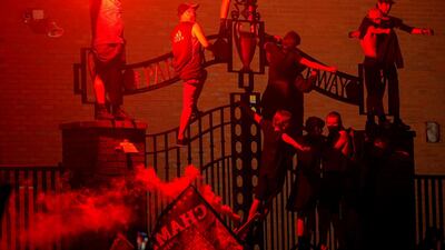 Liverpool fans celebrate their first Premier League title since 1990, when they triumphed under Kenny Dalglish. Getty