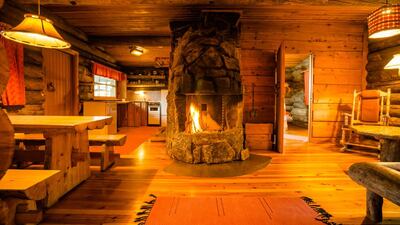A shot of the living room of the log cabin at Kakslauttanen East Village. Courtesy Kakslauttanen Arctic Resort