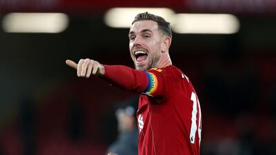 Liverpool's Jordan Henderson celebrates after the final whistle. PA
