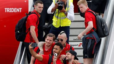 Belgium's players board the plane on their way to France for Euro 2016. Francois Lenoir / Reuters