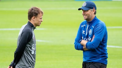 Denmark manager Kasper Hjulmand and Mikkel Damsgaard, left, during a training session in Elsinore,. AP