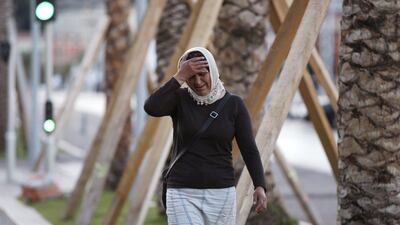 A French woman cries as she walks near the scene of the Nice lorry attack. Luca Bruno / AP Photo