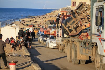 Following Israeli evacuation orders Palestinians head towards southern Gaza on the coastal sea route, on January 4. Bloomberg