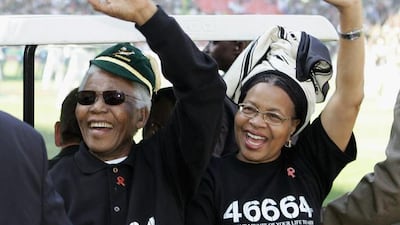 Mandela and his wife Graca Machel prior to the Nelson Mandela Challenge Plate international rugby match between South Africa and Australia in 2005. David Rogers / Getty Images