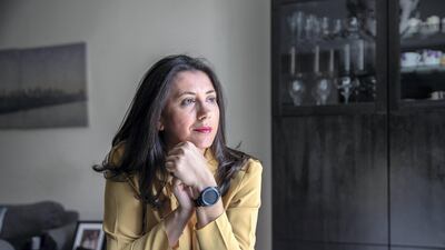 Dubai resident Camelia Georgescu only keeps a small amount in her UAE savings account, instead preferring to store her money in real estate. Victor Besa / The National