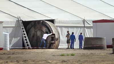Rolling out the structure for the set. Star Wars crew. Qasr Al Sarab, Abu Dhabi, United Arab Emirates. Mona Al Marzooqi/ The National / April 15, 2014)