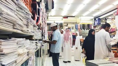 Day 16 — ‘A few days before Eid, we travel to local shops in the old Sharjah souq to buy new traditional clothes for Eid.’ Ammar Al Attar for The National