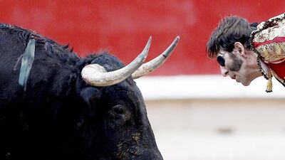 Spanish bullfighter Juan Jose Padilla fights with his second bull during the 8th bullfighting of the Sanfermines 2014 in Pamplona, Spain, on July 12, 2014. Jesus Diges / EPA
