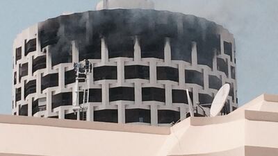 Four people were injured when a fire broke out on the 17th floor of Al Ibrahimi Restaurant building in Electra Street. Delores Johnson / The National