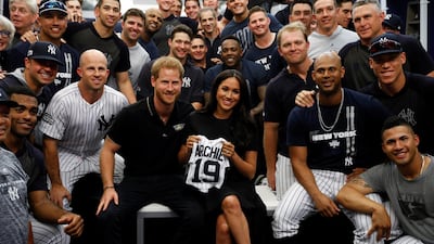 Prince Harry and Meghan, Duchess of Sussex pose for a photo with the New York Yankees at London Stadium on June 29, 2019 in London, England. Getty Images