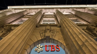 The UBS logo sits at the bank's headquarters in Zurich, Switzerland. UBS is facing billions in fines from US and French lawsuits. Photographer: Adrian Moser