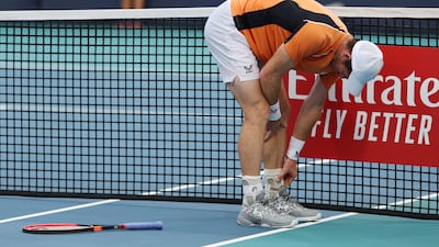 Andy Murray hurting his ankle during the defeat to Tomas Machac at the Miami Open. AFP