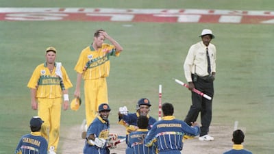 LSri Lanka captain Arunja Ranatunga celebrates with fellow batsman Aravinda De Silva and team mates whilst Shane Warne and Glen McGrath react as umpire Steve Bucknor looks on after the 1996 Cricket World Cup Final. Getty Images