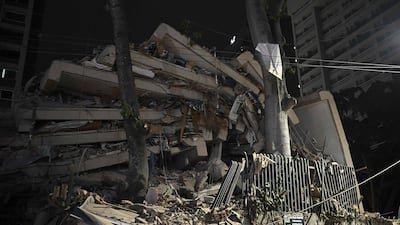 A collapsed building in Caracas. AFP