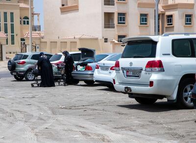 Sand parking lot beside the Khalifa City Post Office. Victor Besa / The National