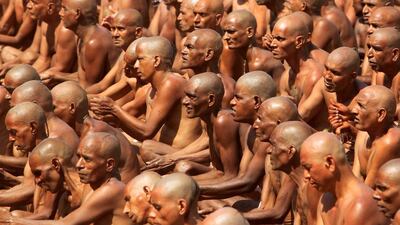 Hindu holy men perform Pinda Daan, a ritual on the banks of Shipra river during Simhastha Kumbh Mela in Ujjain. Jitendra Prakash / Reuters