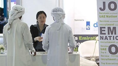 The UAE has named 2013 the year of Emiratisation as it aims to cut the burden on the public sector. Jeff Topping / The National