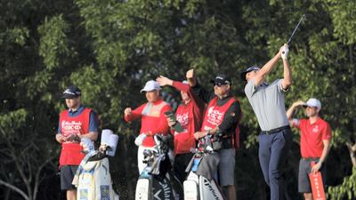 Justin Rose plays a shot off the tee.