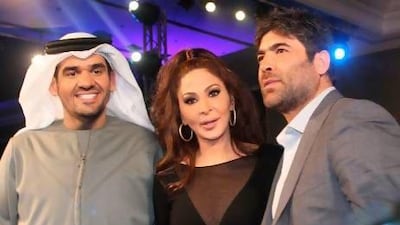 The Lebanese pop stars Wael Kfoury, right, and Elissa, centre, with the Emirati singer Hussein Al Jasmi. AFP